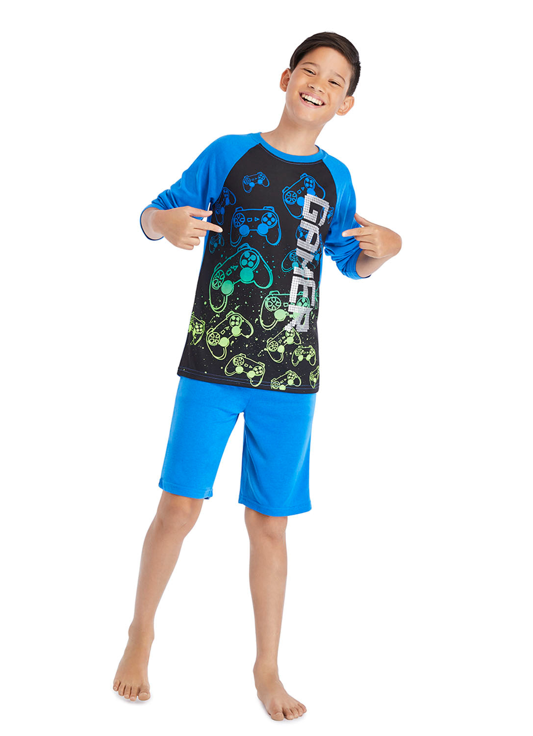 Boy wearing a Gamer Pajama Set, t-shirt and shorts in Royal colour