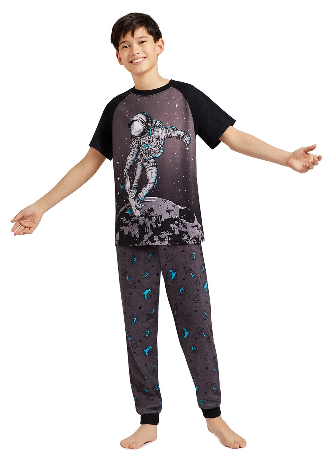 Boy with 2-Piece Pajama Set Astronaut on Skateboard