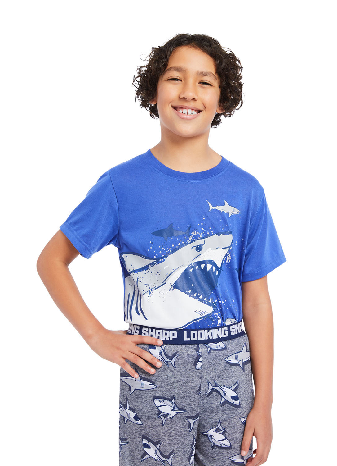 Detail Boy wearing Shark t-shirt print with sharks print shorts