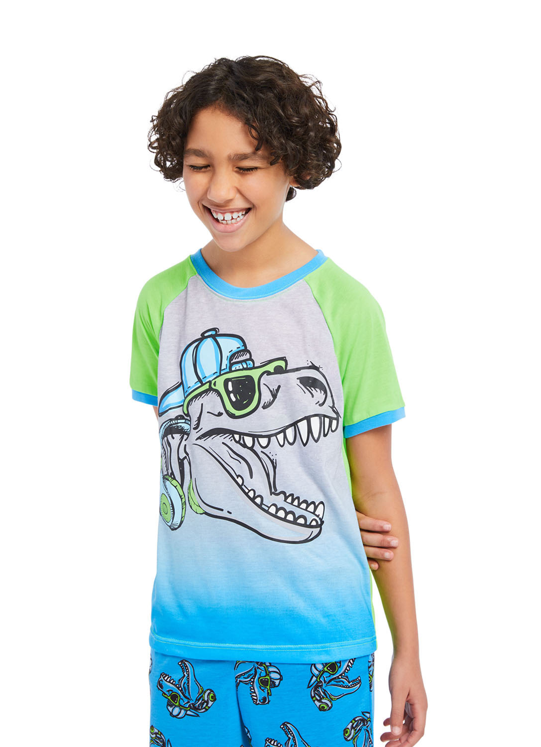 Close up Boy wearing Pajama Set Dino, t-shirt (multi colour) with print and pants (blue) with print