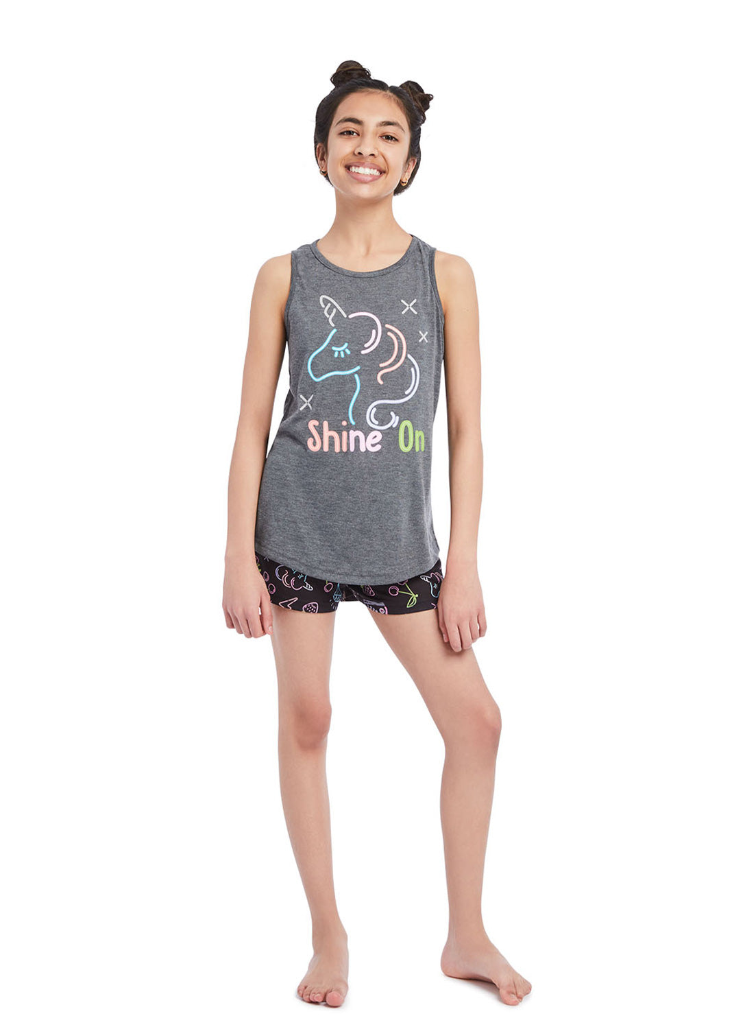 Girl wearing Pj set unicorn, t-shirt (gray) with print and shorts (black) with print
