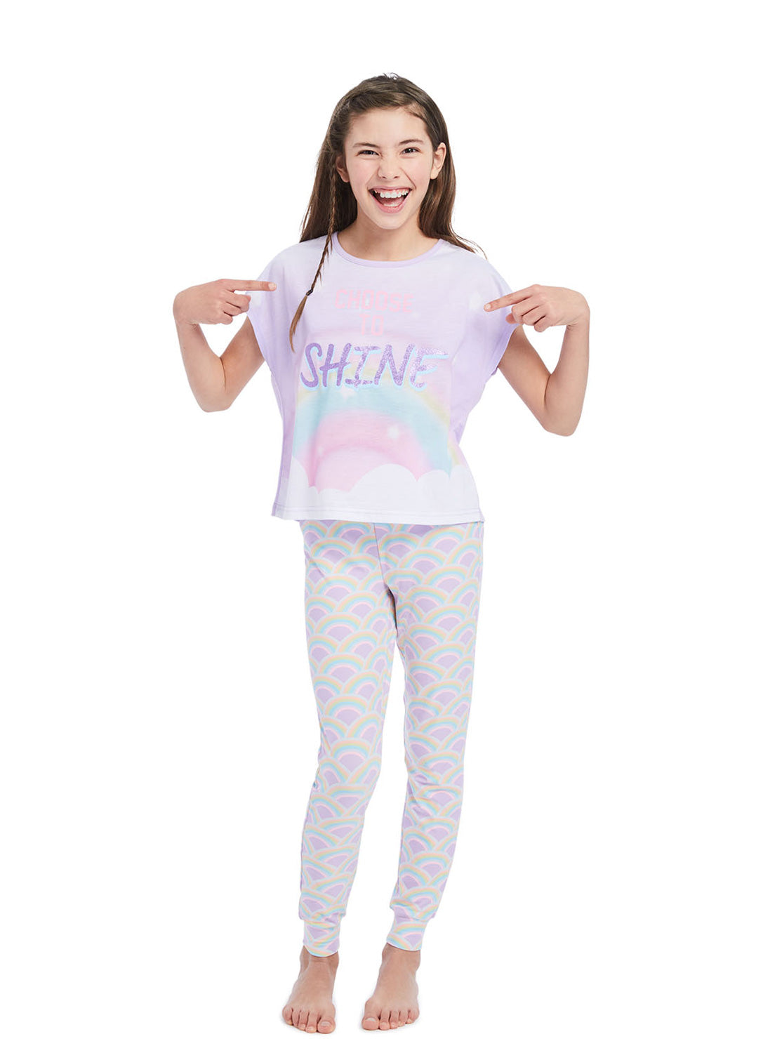 Girl wearing Rainbows Pj set, t-shirt (lilac) with print and Pants (lilac) with Rainbows print  