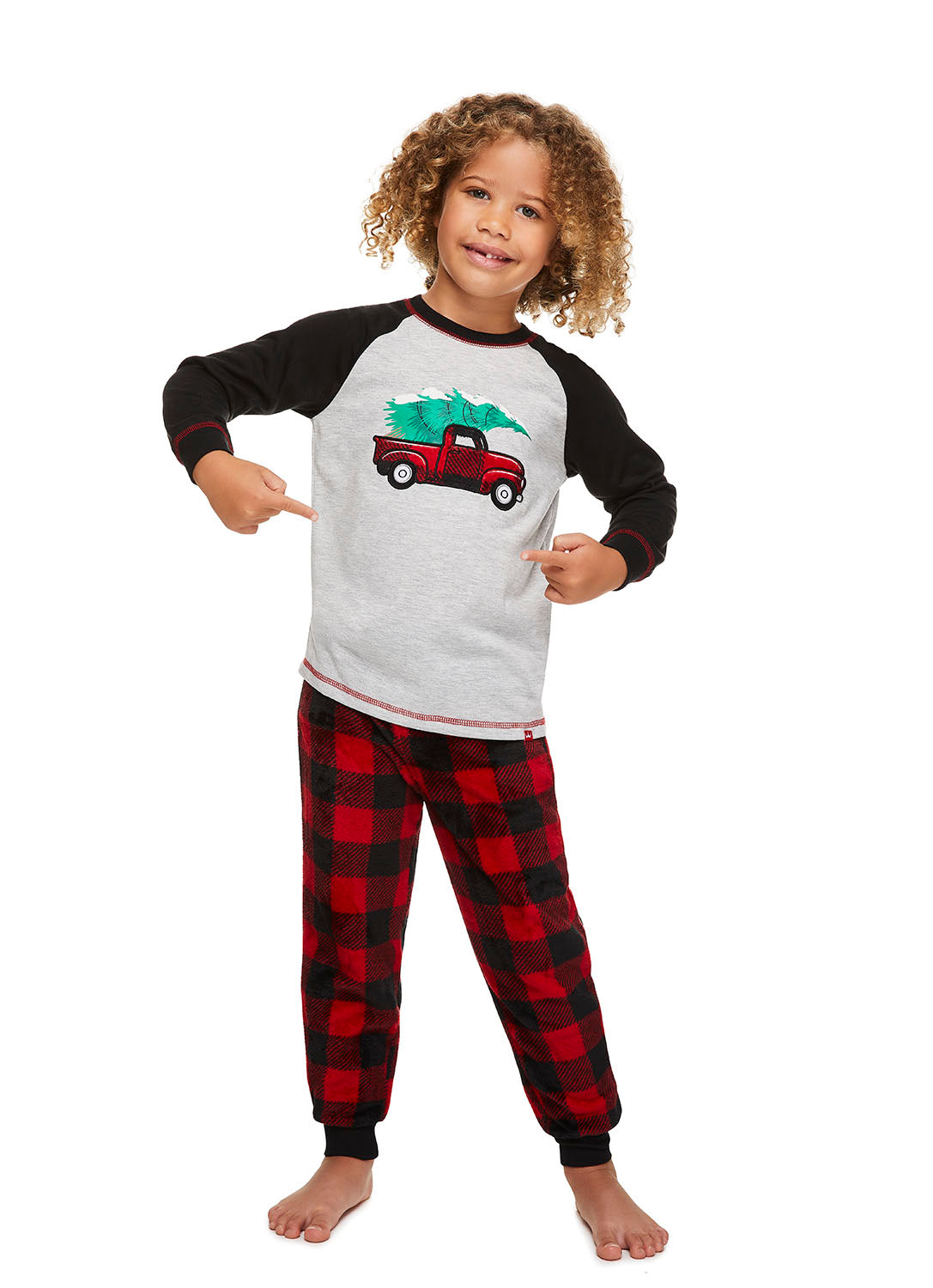 Fun Boy wearing Red Truck Pajama Set