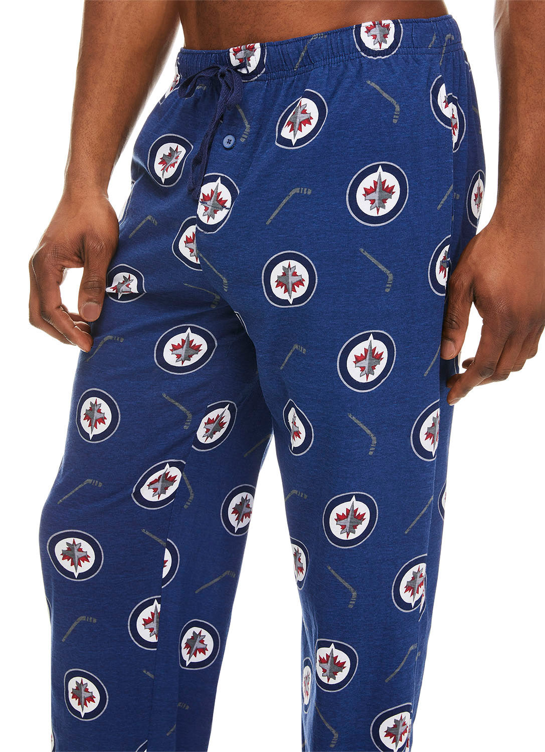 Detail Man wearing Winnipeg Jets Cotton Sleep Pant with logo and hockey stick print (Blue)
